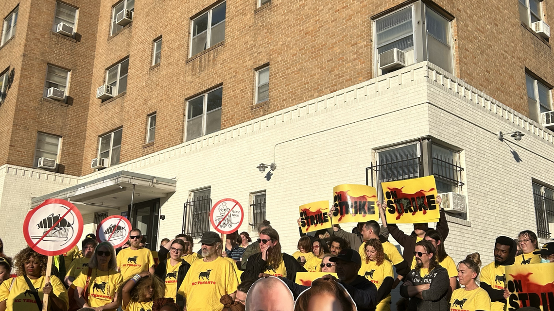 Residents at Indpendence Towers and Quality Hills gathered around a mock “bargaining table” on Oct. 18 as they marked 18 days of withholding more than $60,000 in rent.