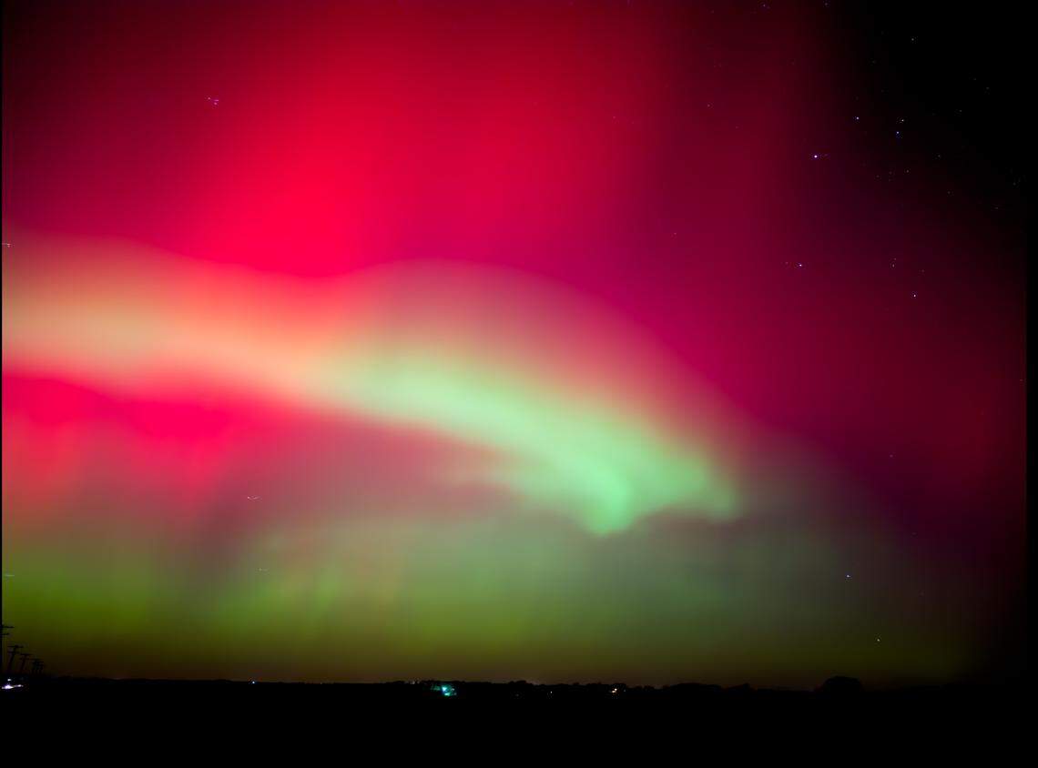 The pink and green from the Aurora Borealis blended together in this photo from Steven Brockschmidt from Maysville, an hour north of Kansas City.