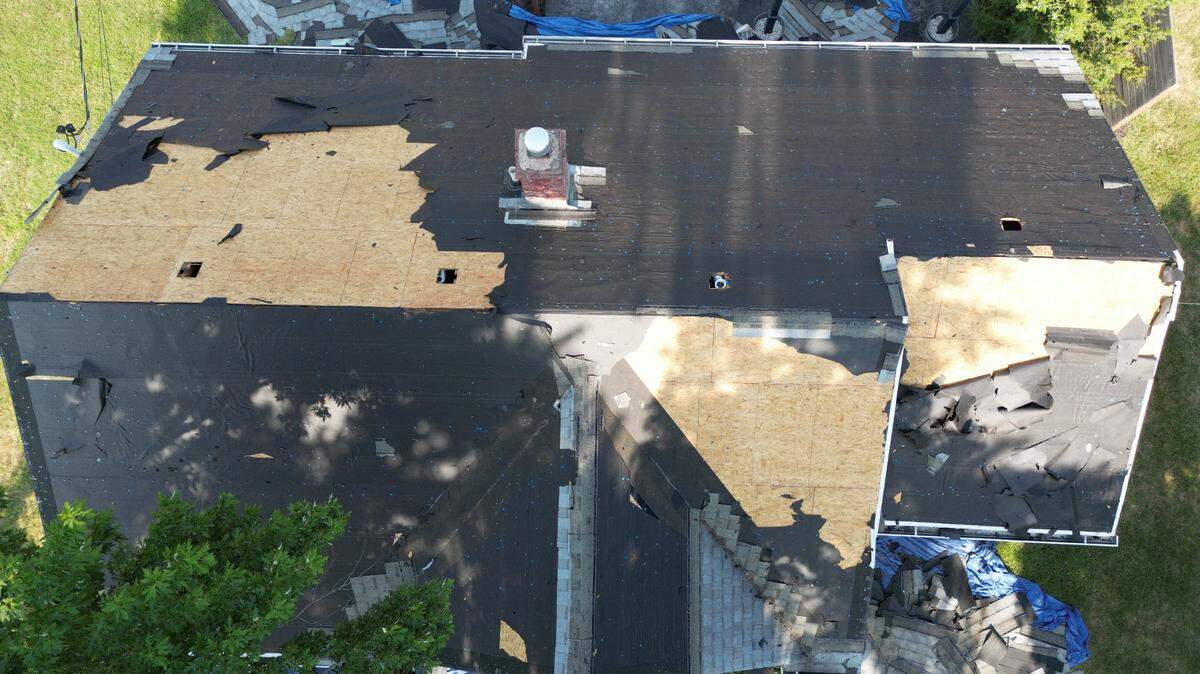 An Overland Park homeowner says a crew took his roof off by mistake before vanishing.