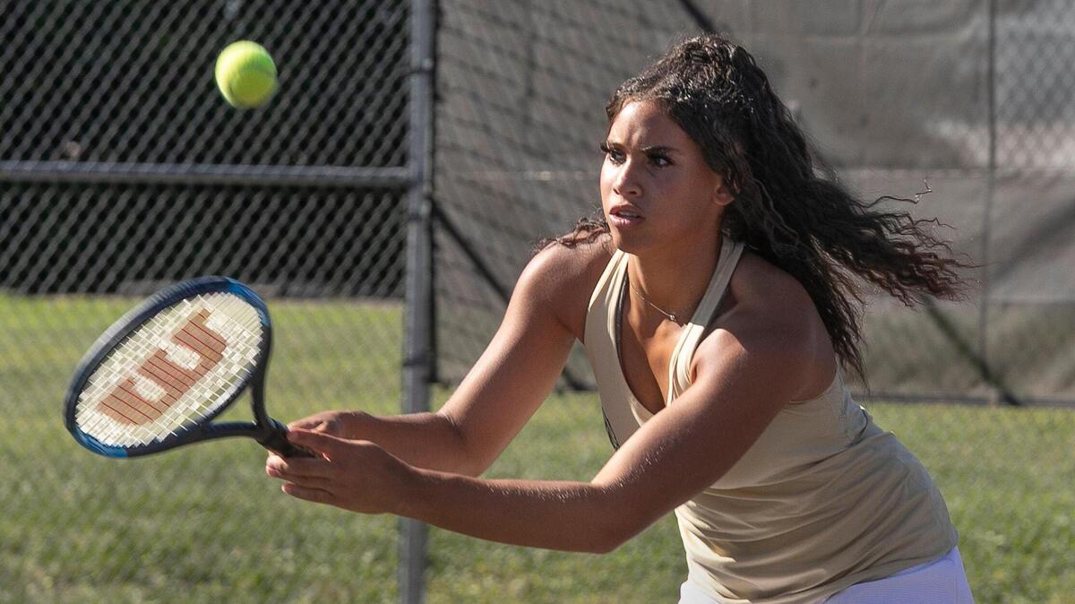 “She helped me understand that you can be aggressive in a positive way,” said Angelea Johnson, a sophomore on the Lee’s Summit High School tennis team.