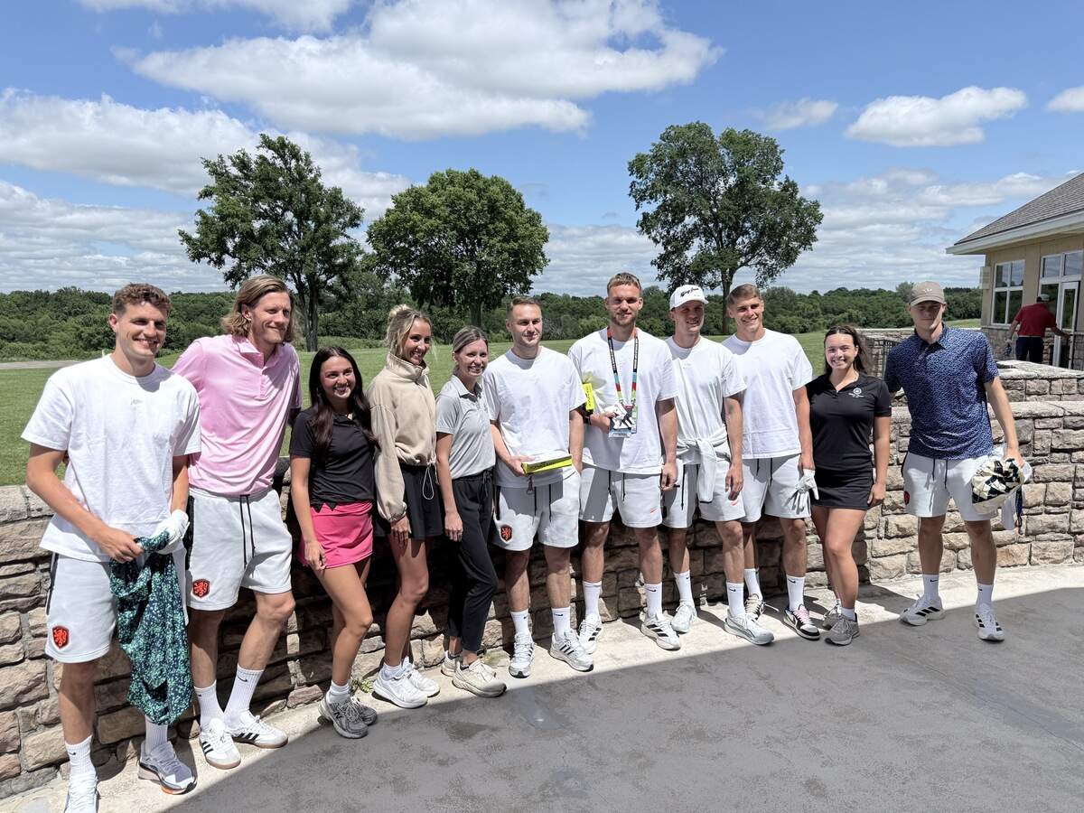 Members of the Dutch World Cup soccer team at Tiffany Springs Golf Club on Monday, June 22, together with club employees, left to right, Sophia Rodriguez, Rylee Cisna, Hannah Noll and Isabella Cerv.