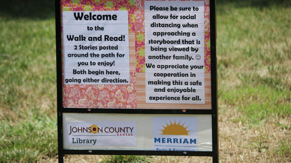 The Johnson County Library put signs along the trail at Quail Creek Park in Merriam as part of its Walk and Read program.