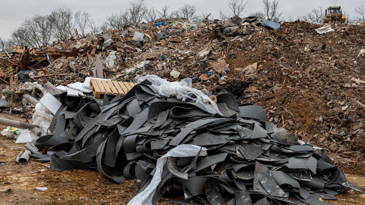 Roofing materials are seen in a pile at the Flat Land Excavating landfill on Tuesday, March 23, 2023, in Easton, Kan.