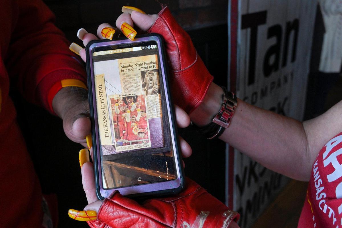 Adrian Gonzalez and Robin Adams shared a newpaper photo of Gonzalez taken in 1992 at a Chiefs Monday Night Football game in Kansas City. Gonzalez, who said he’s always been a Chiefs fan, gathered with other fans Wednesday, Feb. 8, 2023 at Pub Rock Live, a Chiefs bar in Scottsdale Arizona. The couple are from Tonopah, Arizona.