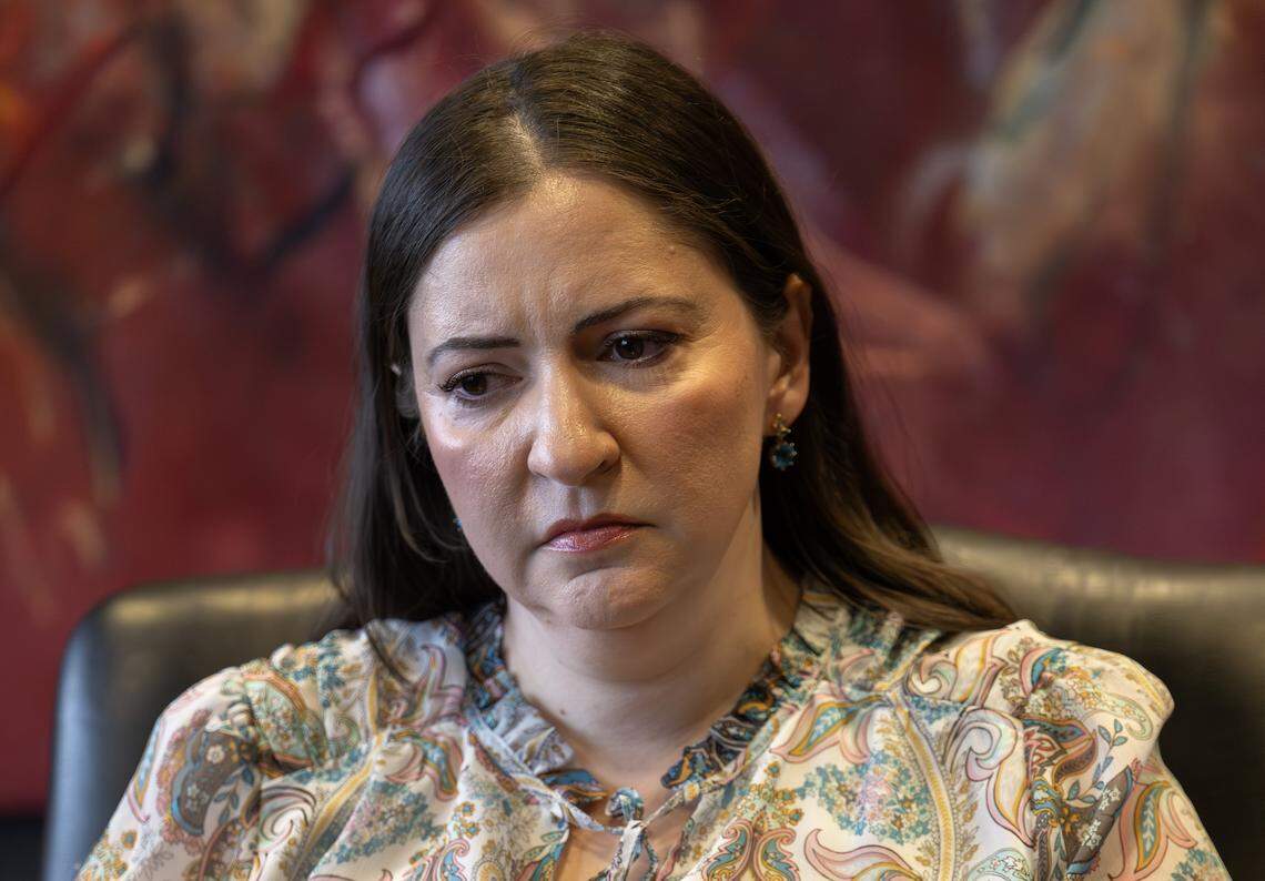 Kristy Schroll sits pensively while being interviewed at her lawyer's office on Friday, March 6, 2026, in Kansas City.