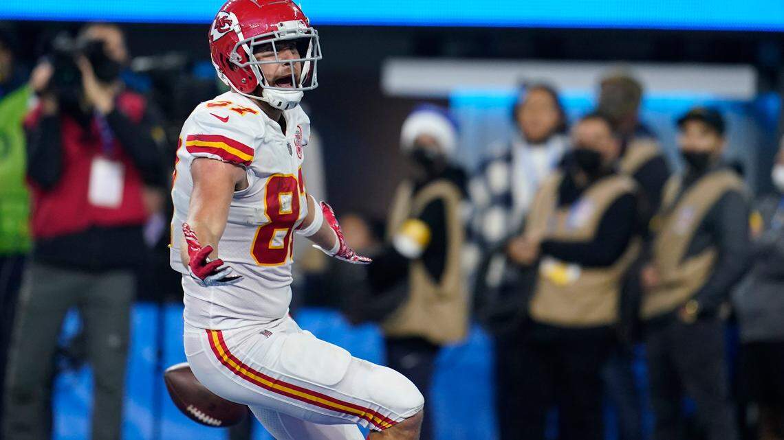 Kansas City Chiefs tight end Travis Kelce runs on his way to scoring a touchdown during overtime in an NFL football game against the Los Angeles Chargers, Thursday, Dec. 16, 2021, in Inglewood, Calif. (AP Photo/Marcio Jose Sanchez)