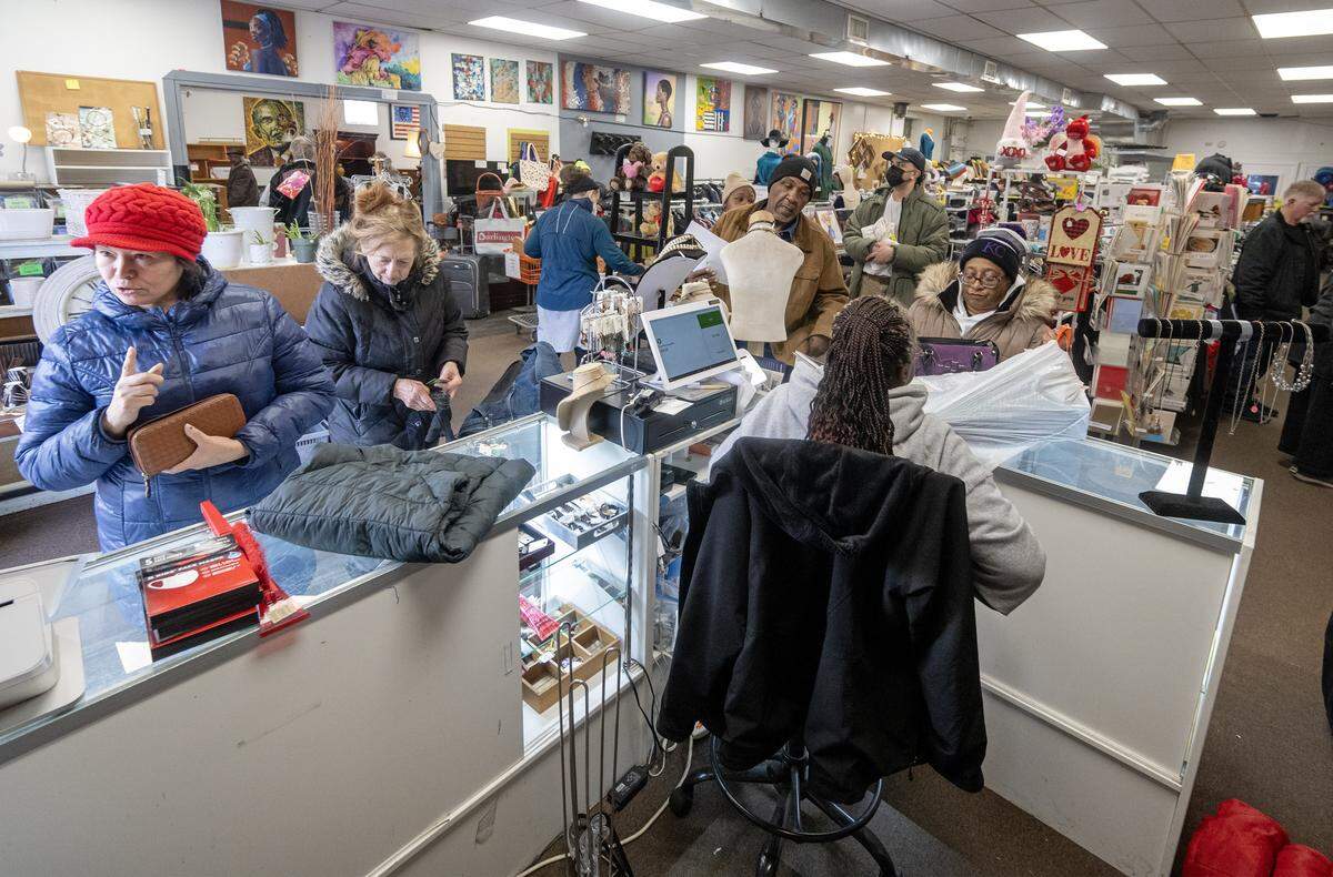 Customers line up to check out after shopping at Troost39, a thrift store at 3922 Troost Ave., on Thursday, Jan. 22 2026, in Kansas City.