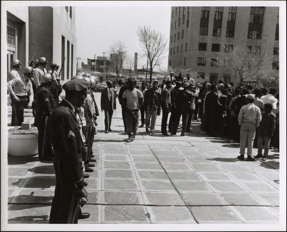 Students and community members gathered at City Hall with a heavy police presence.