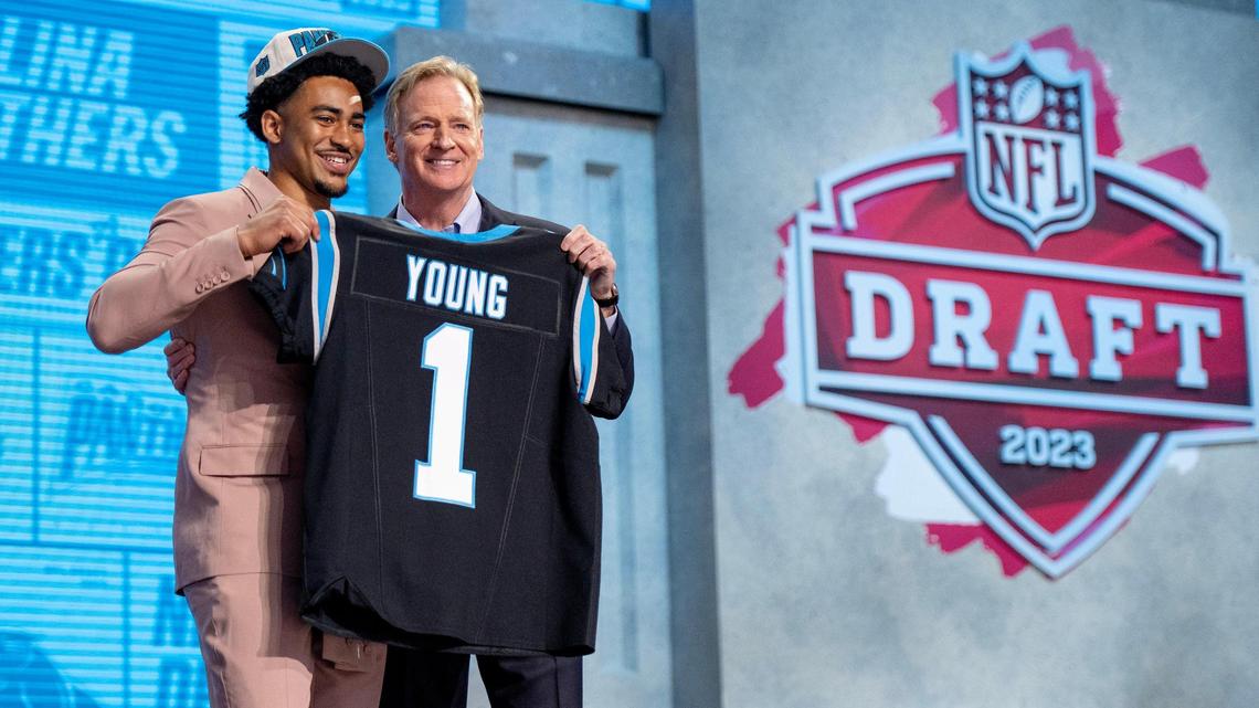 Alabama quarterback Bryce Young poses for photos with NFL Commissioner Roger Goodell after being picked first overall by the Carolina Panthers during the NFL Draft outside of Union Station on Thursday, April 27, 2023, in Kansas City.