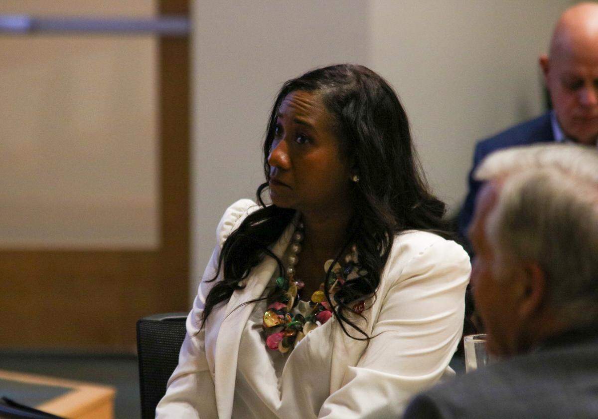 Mayor Pro Tem Rayna Parks-Shaw listens to a speaker at a public safety symposium March 15, 2024. Leaders discussed ways to prevent and create lasting change when it comes to gun violence in Kansas City.