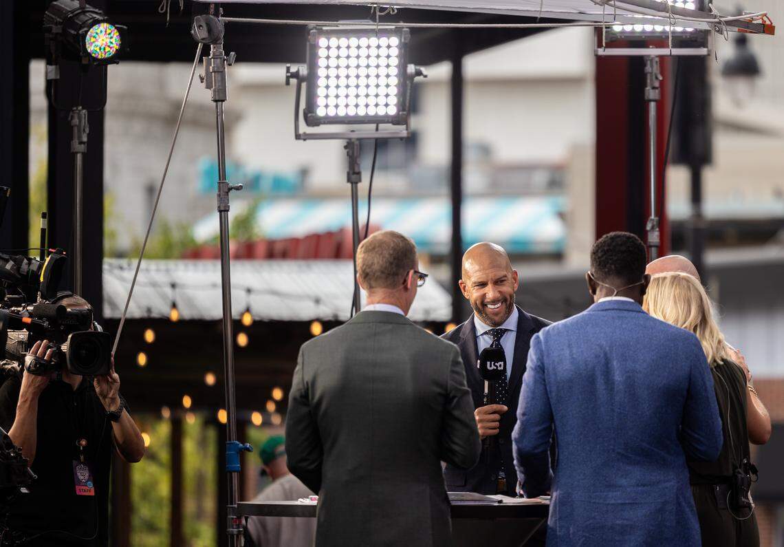 Former United States Men’s National Team goalkeeper and TV commentator Tim Howard smiles during a TV hit on Premier League Mornings Live at Kansas City’s Power & Light District on Saturday, Sept. 20.