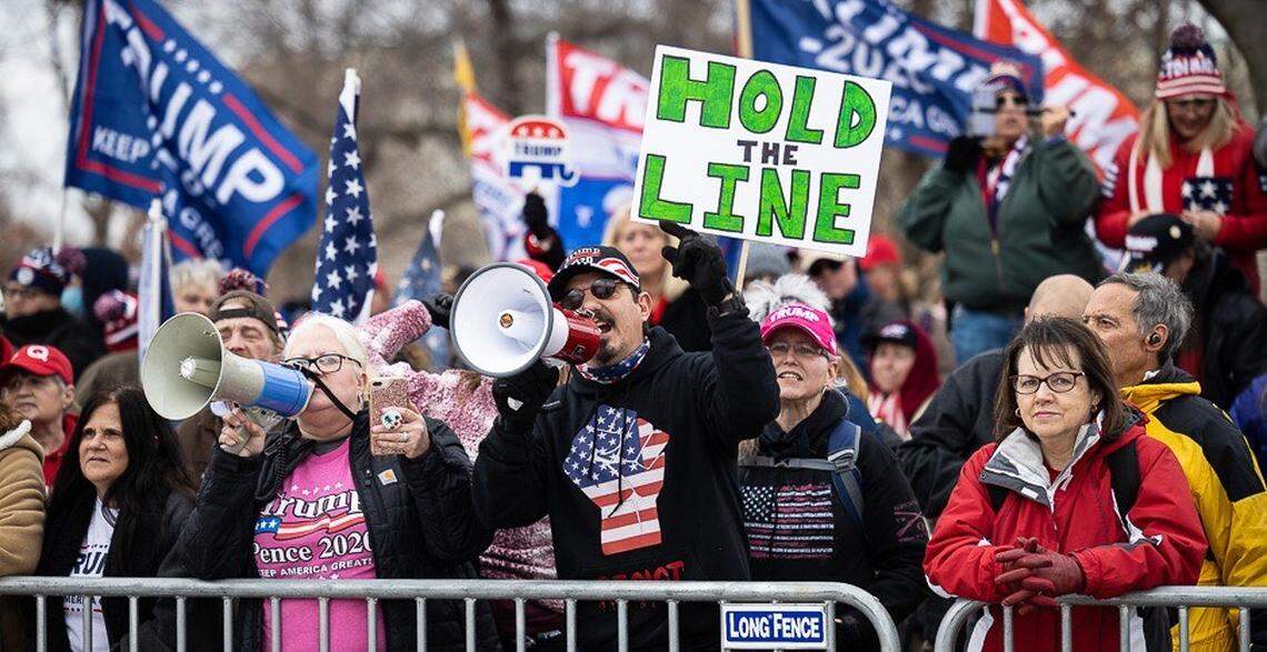 The crowd assembled around the time Senator Josh Hawley waved and fist pumped walking accross the Capitol builing.