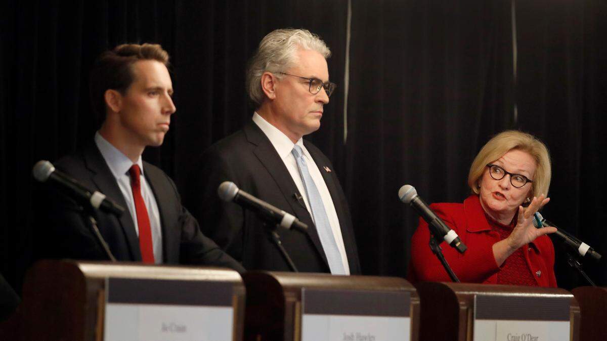 Incumbent Democratic Sen. Claire McCaskill (right) speaks alongside Independent candidate Craig O’Dear (center) and Republican U.S. Senate candidate Josh Hawley during a candidate forum at the annual Missouri Press Association convention Friday in Maryland Heights, Mo.