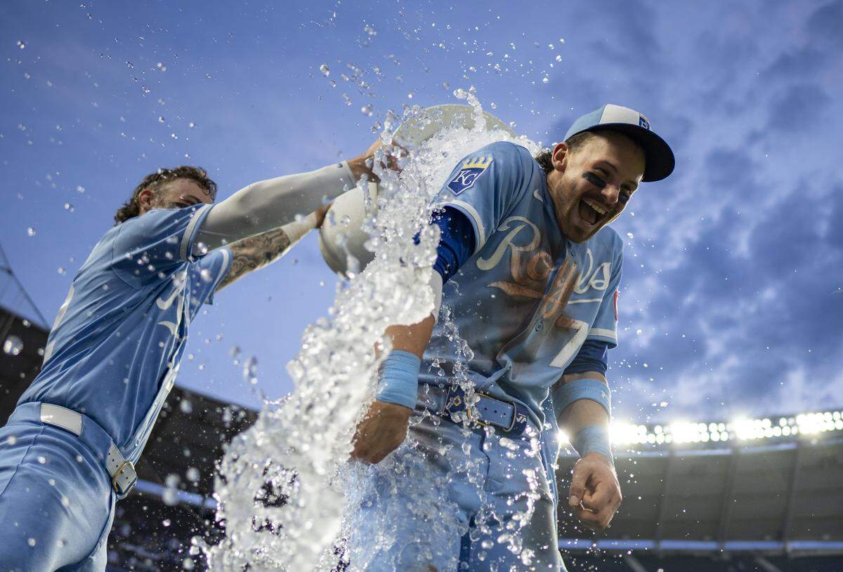 Royals superstar Bobby Witt Jr. is doused with water by teammate Carter Jensen after KC’s 5-1 defeat of the Detroit Tigers at Kauffman Stadium in Kansas City on Saturday, May 9, 2026.