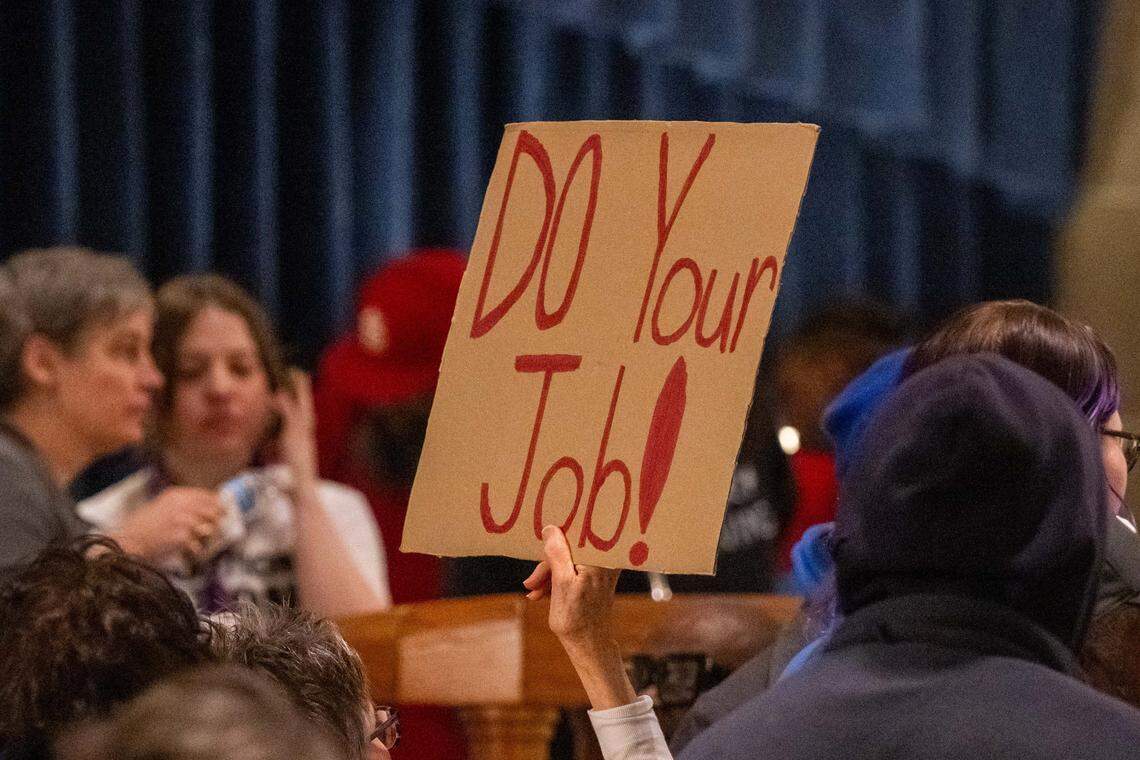 Protesters hold signs in the Missouri State Capitol rotunda on Wednesday, January 21, 2026 in Jefferson City. Organizations and allies gathered to protest recent Missouri lawmaker's decisions.