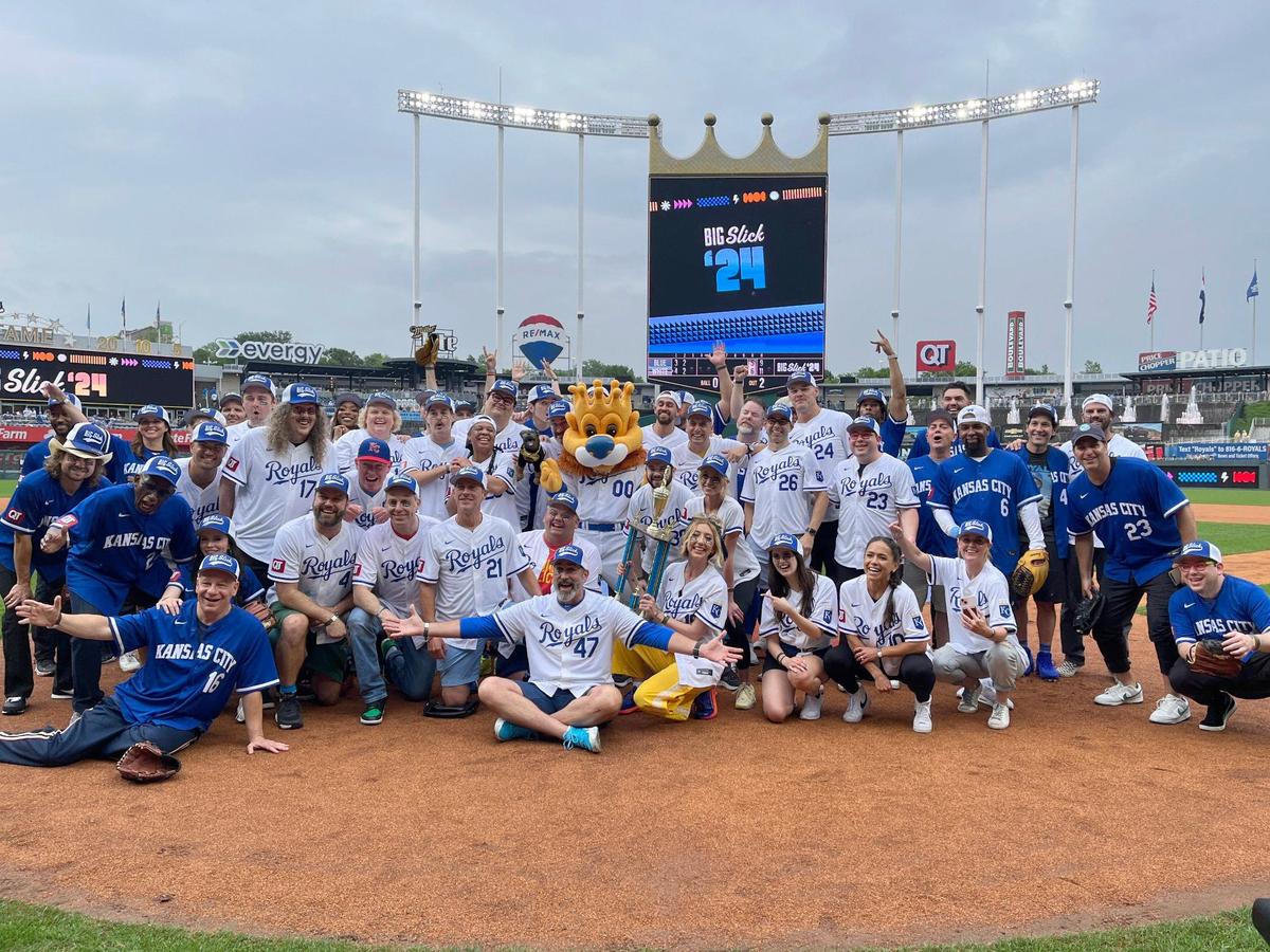 Celebrities that played in the Big Slick celebrity softball game pose for a photo during the Big Slick celebrity softball game at Kauffman Stadium on Friday, May 31, 2024, in Kansas City.