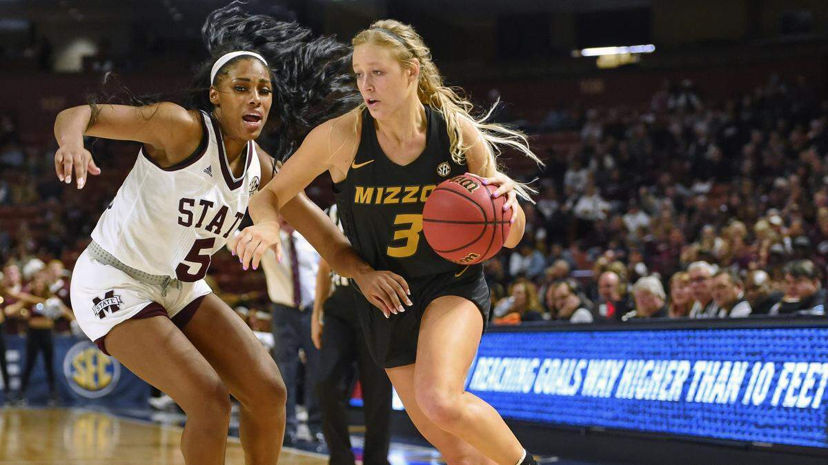 Missouri’s Sophie Cunningham (3) drives against Mississippi State’s Anriel Howard during the second half of an NCAA college basketball game in the Southeastern Conference women’s tournament Saturday, March 9, 2019, in Greenville, S.C. (AP Photo/Richard Shiro)