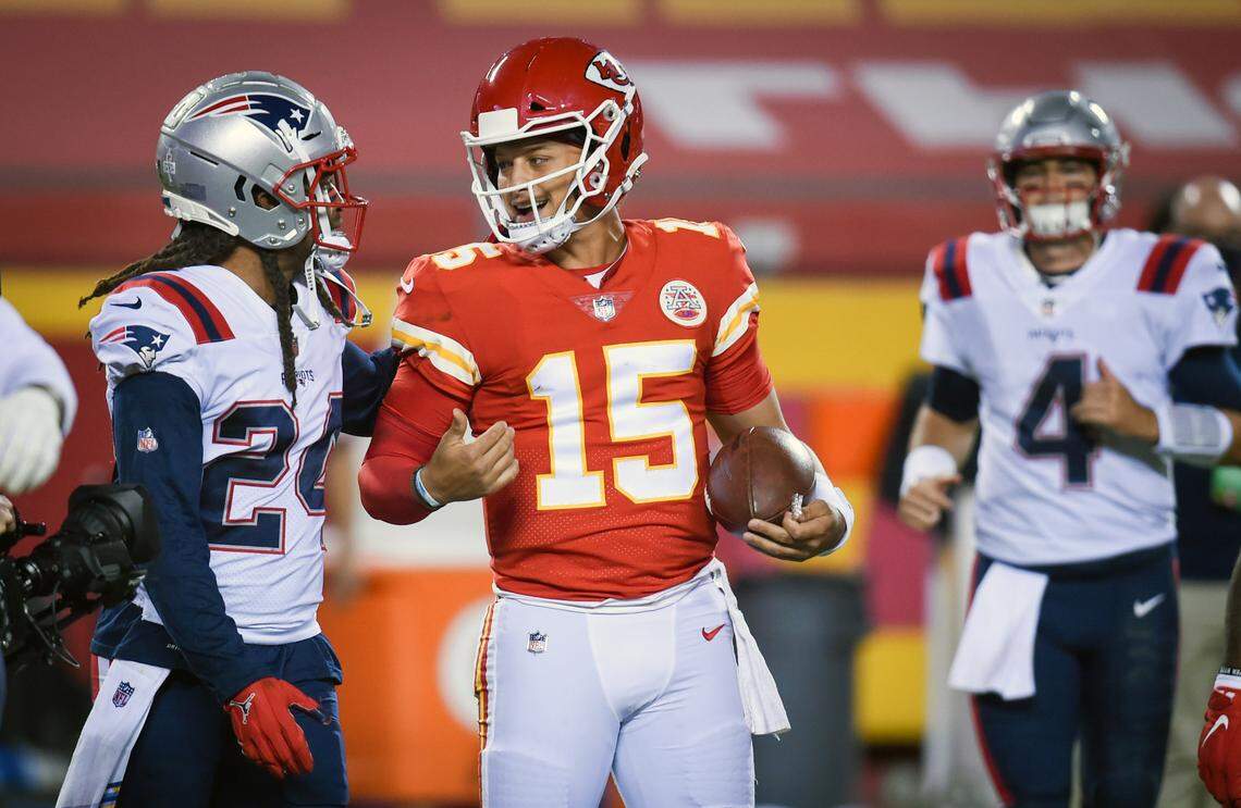 Patriots cornerback Stephon Gilmore (24) greets Chiefs quarterback Patrick Mahomes (15) after Kansas City defeated New England, 26-10, at Arrowhead Stadium on Monday, Oct. 5, 2020, in Kansas City. Media outlets are reporting that Gilmore has tested positive for COVID-19.