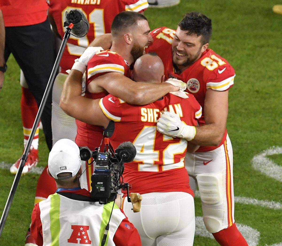 Kansas City Chiefs Travis Kelce, Blake Bell and Anthony Sherman celebrate after the Chiefs beat the San Francisco 49ers, 31-20 in Super Bowl 54 Sunday night in Miami.