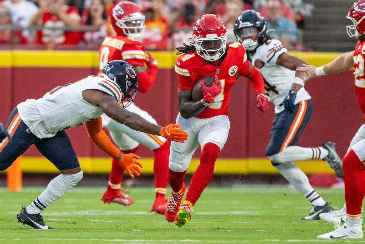 Kansas City Chiefs' Rashee Rice (4) runs in the open field after a catch in the first quarter of the Chiefs preseason game vs. the Chicago Bears at GEHA Field at Arrowhead Stadium on Friday, Aug. 22, 2025, in Kansas City.