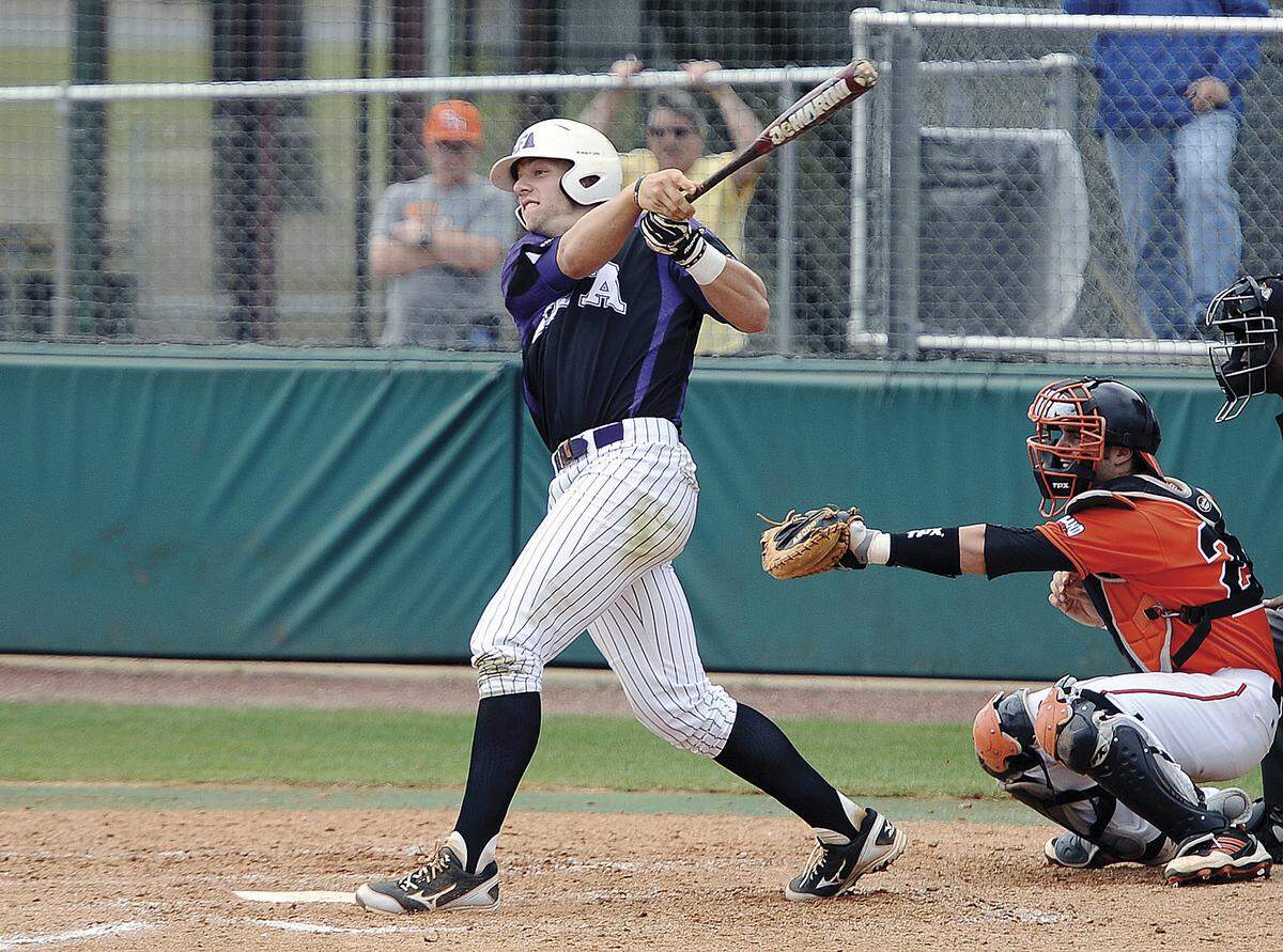 Future Royals infielder Hunter Dozier strokes a double for Stephen F. Austin during a game in 2013.