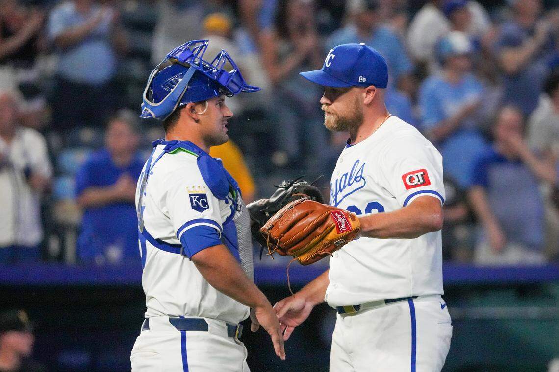 Kansas City Royals relief pitcher Jonathan Bowlan (62) celebrates with catcher Luke Maile (15) after the win over the Pittsburgh Pirates at Kauffman Stadium on Jul 7, 2025 in Kansas City, Missouri, USA.