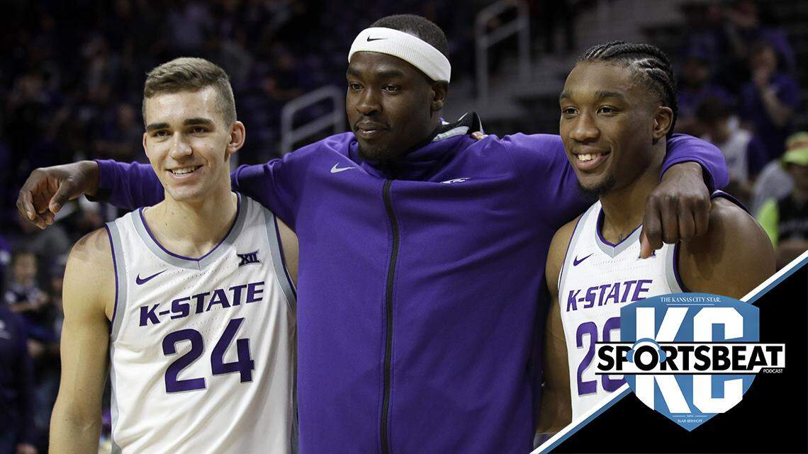 Kansas State seniors Pierson McAtee, left, Xavier Sneed, right, and Makol Mawien, middle, pose for photographers before an NCAA college basketball game against Iowa State in Manhattan, Kan., Saturday, March 7, 2020. The trio played in their last home game. (AP Photo/Orlin Wagner)