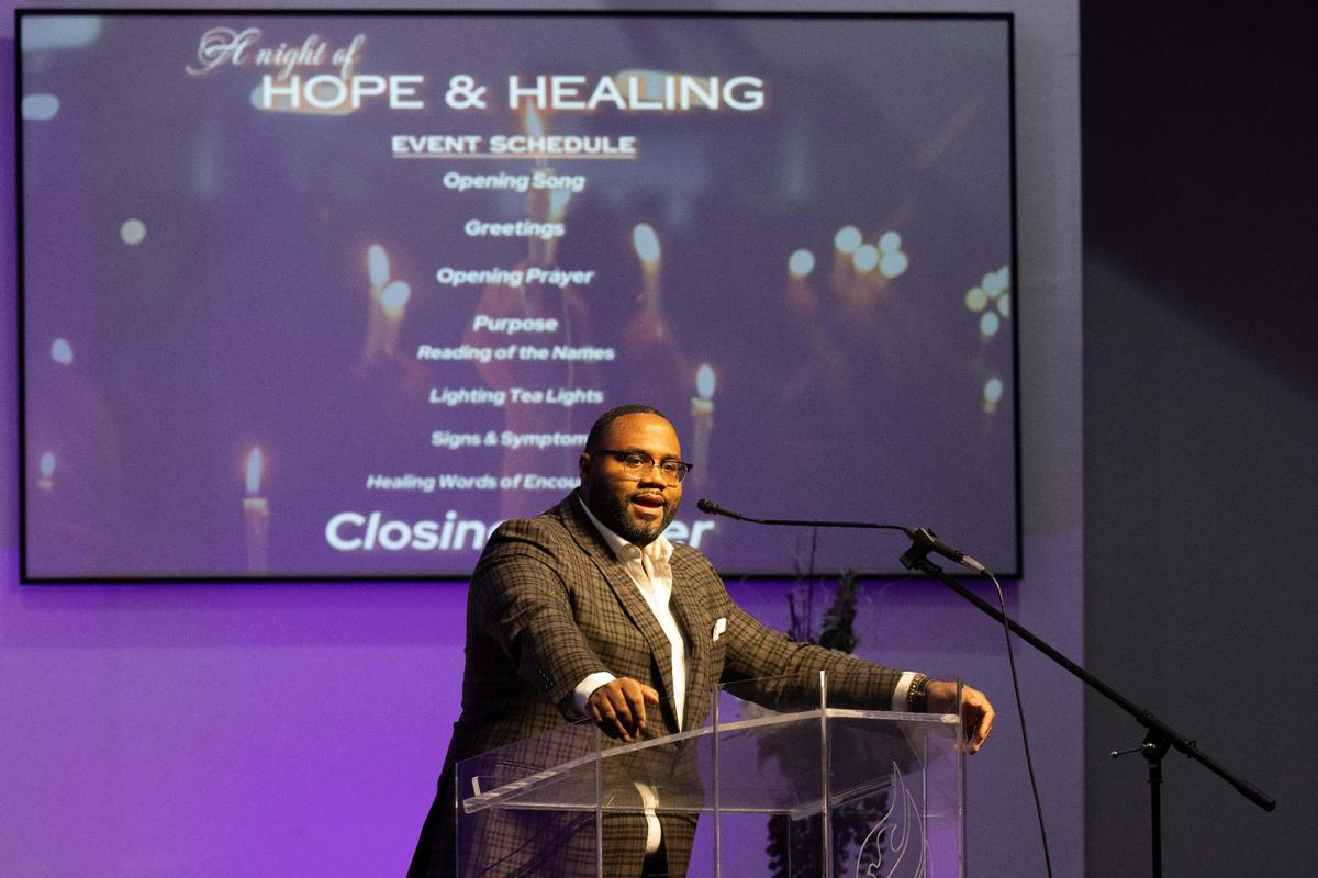Branden Mims, the COO of AdHoc Group Against Crime, speaks at a prayer vigil held on Monday, Dec. 30, 2024 at Great Metropolitan Church of Christ in Kansas City.