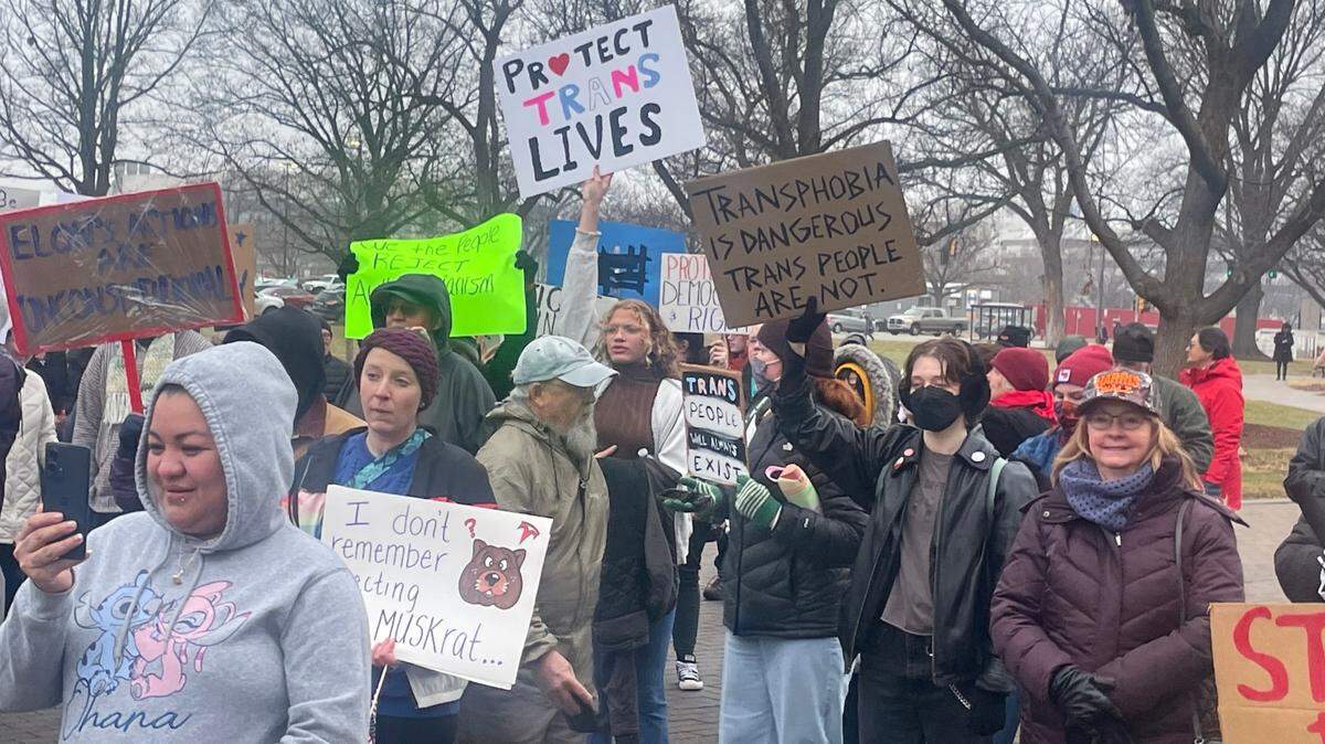 Protesters demonstrate outside the Kansas Capitol on Feb. 5. Numerous protesters voiced objections to the Kansas Legislature’s efforts to enact a ban on gender-affirming care for minors. That bill will now become law after lawmakers successfully voted to override Gov. Laura Kelly’s veto.