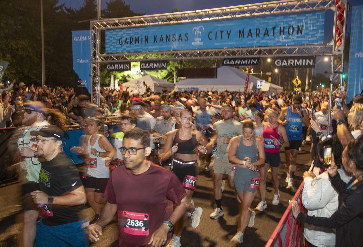 Marathon and half-marathon runners take off from the starting line in the 2025 Garmin Kansas City Marathon on Saturday, Oct. 18, 2025, in Kansas City.