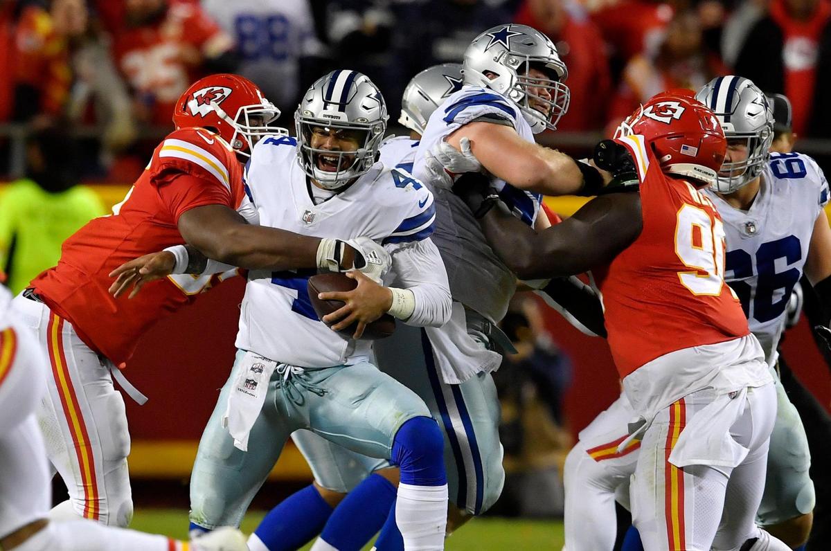 Kansas City Chiefs defensive tackle Chris Jones, left, sacks Dallas Cowboys quarterback Dak Prescott during the fourth quarter of Sunday’s NFL game at Arrowhead Stadium. Kansas City won, 19-9.