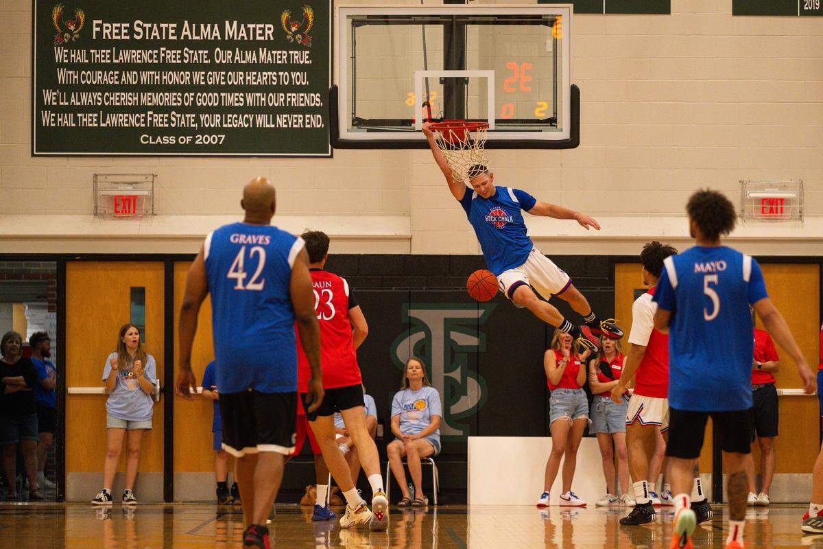 Tyrel Reed dunks the ball during the Rock Chalk Roundball Classic at Free State High in Lawrence, Kansas on Thursday, June 4, 2026.