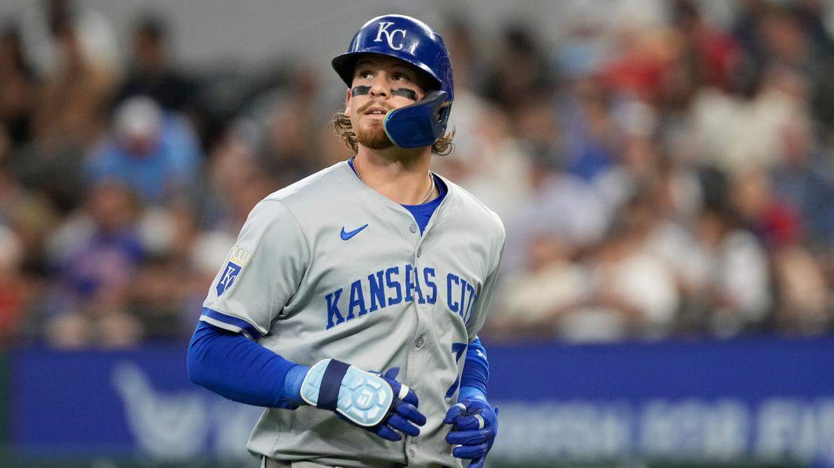 Kansas City Royals shortstop Bobby Witt Jr. (7) returns to the dugout after grounding out against the Texas Rangers during the seventh inning at Globe Life Field on Jun 23, 2024 in Arlington, Texas, USA.