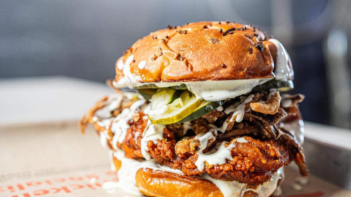 The Crack Shack’s Firebird, a spicy fried chicken thigh with crispy onions, pickles and cool ranch sauce on an artisan potato roll.