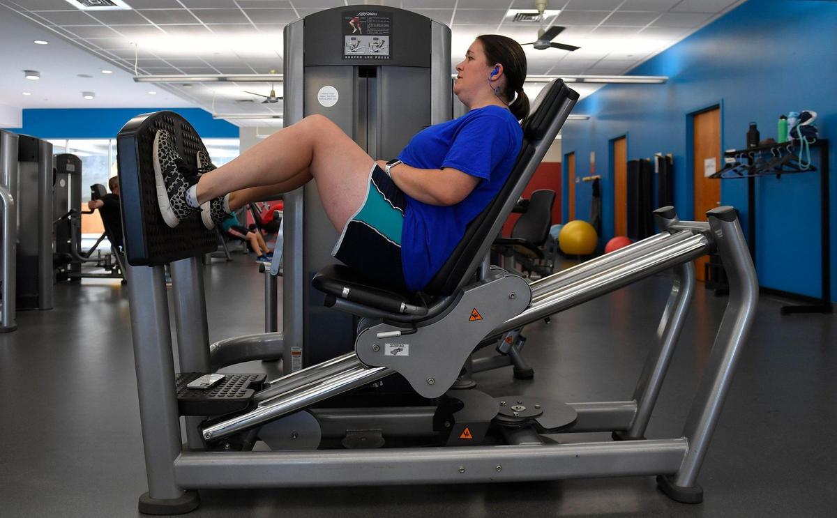 Ali Brown trained recently at a local gym to prepare for the Special Olympics USA in Orlando. Last week she won gold in the 4x100 swim relay, while her husband, Patrick, won the 200-meter dash. The couple, who both have Asperger’s Syndrome, trained five days a week — often alone because of the pandemic. Pushing through doubt, Patrick and Ali said they relied on each other to get through the hard work.