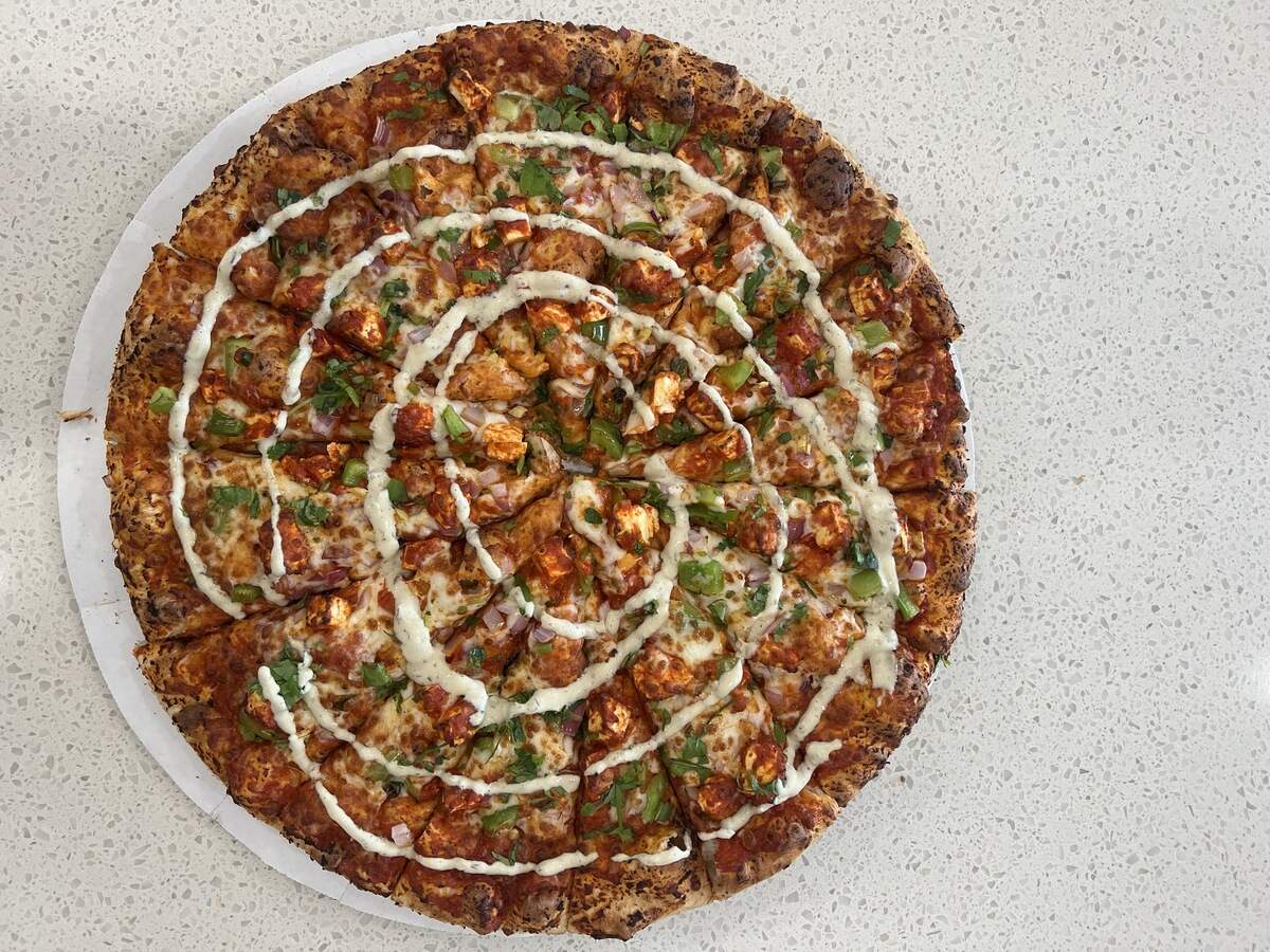Urban Eat’s tikka masala pizza with jalapeño ranch drizzle.