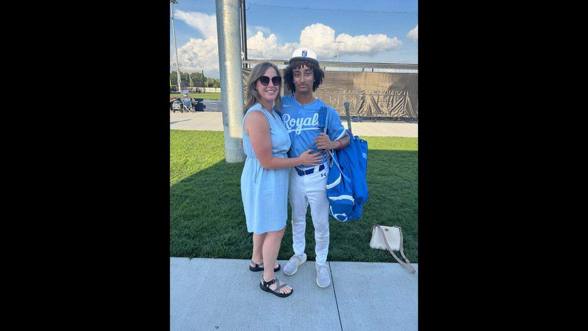 Treyton Hartsook is seen in his Team KC baseball uniform with his mom Amber Hartsook.