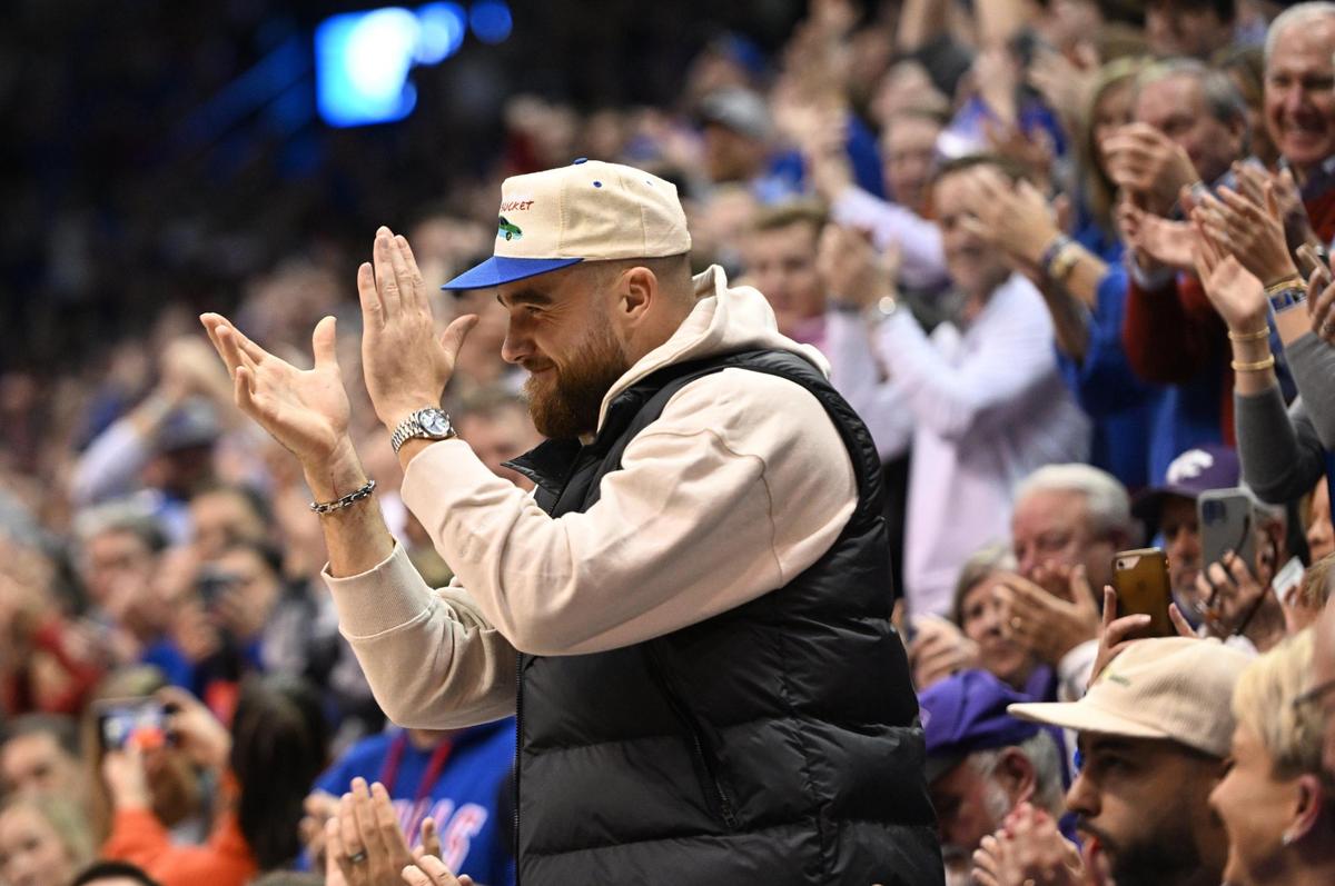Kansas City Chiefs tight end Travis Kelce got the Allen Fieldhouse crowd fired up after he was introduced during the first half of a Sunflower Showdown game on Jan. 31, 2023.