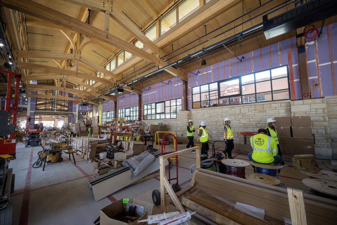 Work continues on the new Overland Park Farmers Market pavilion and the Clock Tower Landing, a $34 million project underway in downtown Overland Park on Tuesday, April 21, 2026. The first farmers market is set to open at 7 a.m. Saturday, June 6, 2026 in this pavilion. 