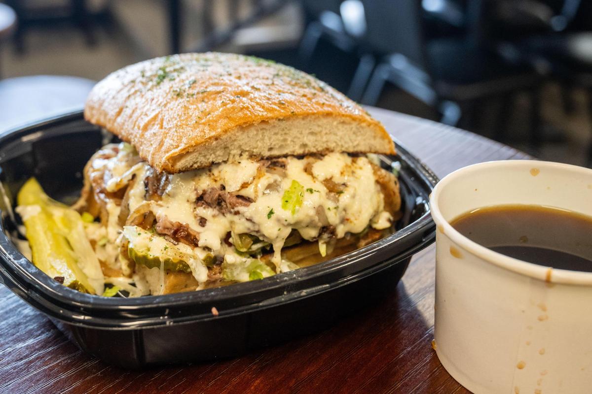 The Prime Time sandwich at The Upper Cut on Thursday, July 24, 2025 in Liberty. This is one of their ‘Top 10’ sandwiches and features slow smoked prime rib, garlic aioli, and a house-made au ju for dipping.