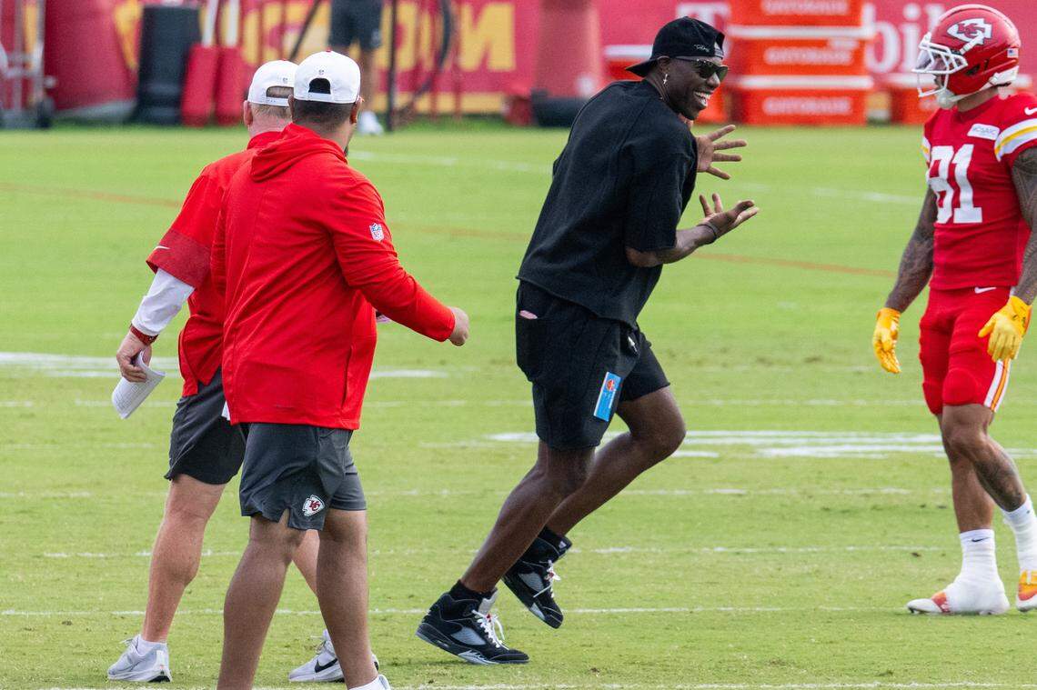 Former NFL wide receiver Terrell Owens pretends to go out for a route at Chiefs Training Camp on Thursday, Aug. 7, 2025 in St. Joseph. Owens, who played for head coach Andy Reid when he coached the Philadelphia Eagles, attended training camp and interacted with several players and coaches.