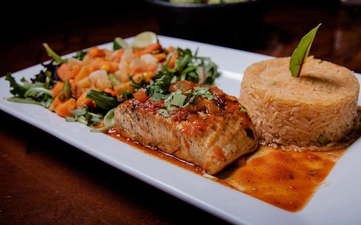 Añejo’s grilled mahimahi marinated in garlic chipotle sauce and served with Mexican rice and mixed vegetables.