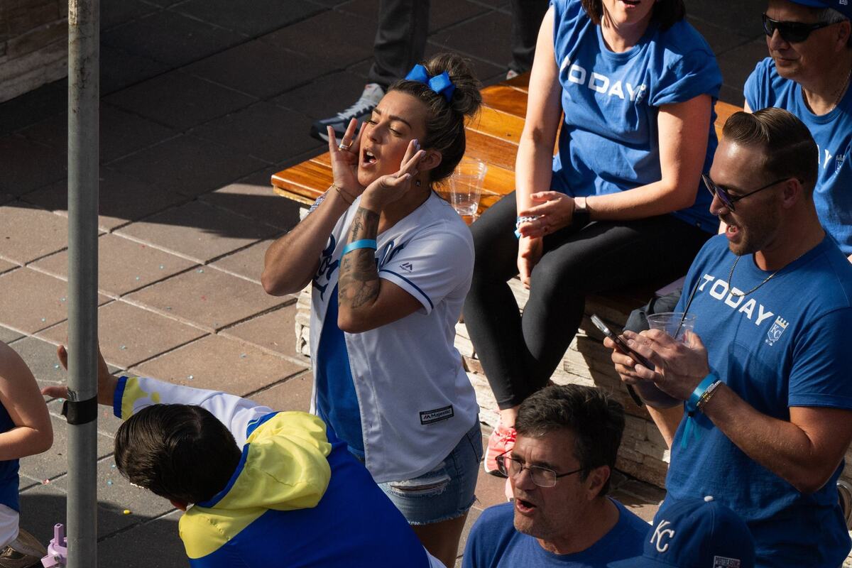 Fans and Kansas City Royals personnel watch the Royals opening playoff game vs. the Baltimore Orioles during a watch party at the Power & Light District on Tuesday, Oct. 1, 2024. The Royals won the game 1-0.