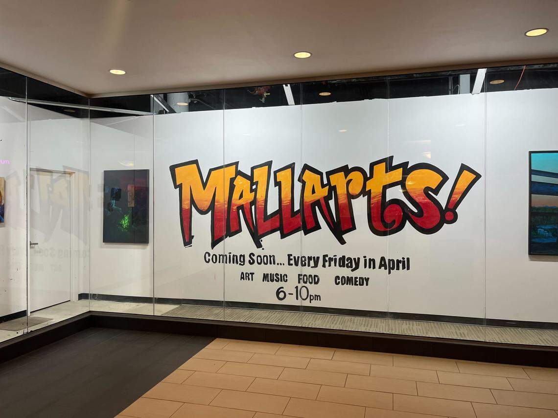 A mural inside the Ward Parkway Mall alerts visitors of Mallarts, a free art gallery opening in April. It’ll be open to the public from 6-10 p.m. every Friday.