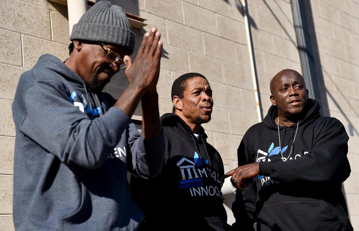 Miracle of Innocence co-founders Lamonte McIntyre, left, and Darryl Burton, right, joined Keith Carnes to speak during a press conference at Carnes’ attorney’s office Monday, April 11, 2022. Carnes was freed from prison after 18 years. The prosecutor’s office declined to file charges after the Missouri Supreme Court threw out his conviction for murder and armed criminal action. All three men are exonerees.