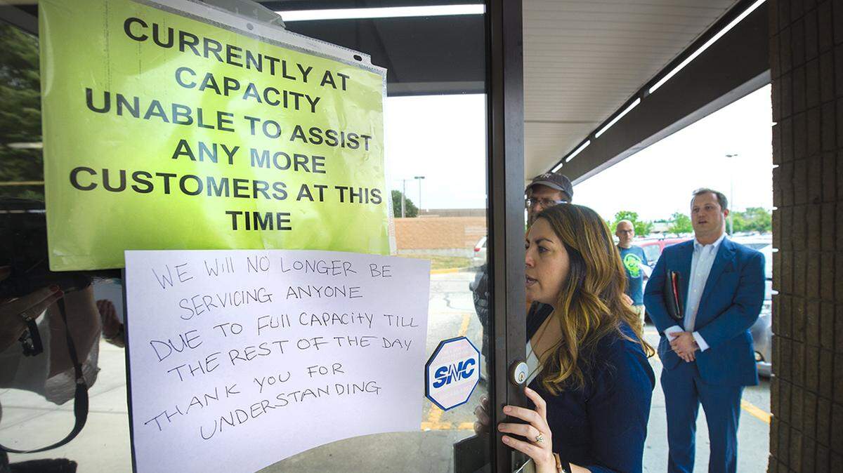 Signs turned away people seeking service at the Kansas driver’s license office in Mission recently.