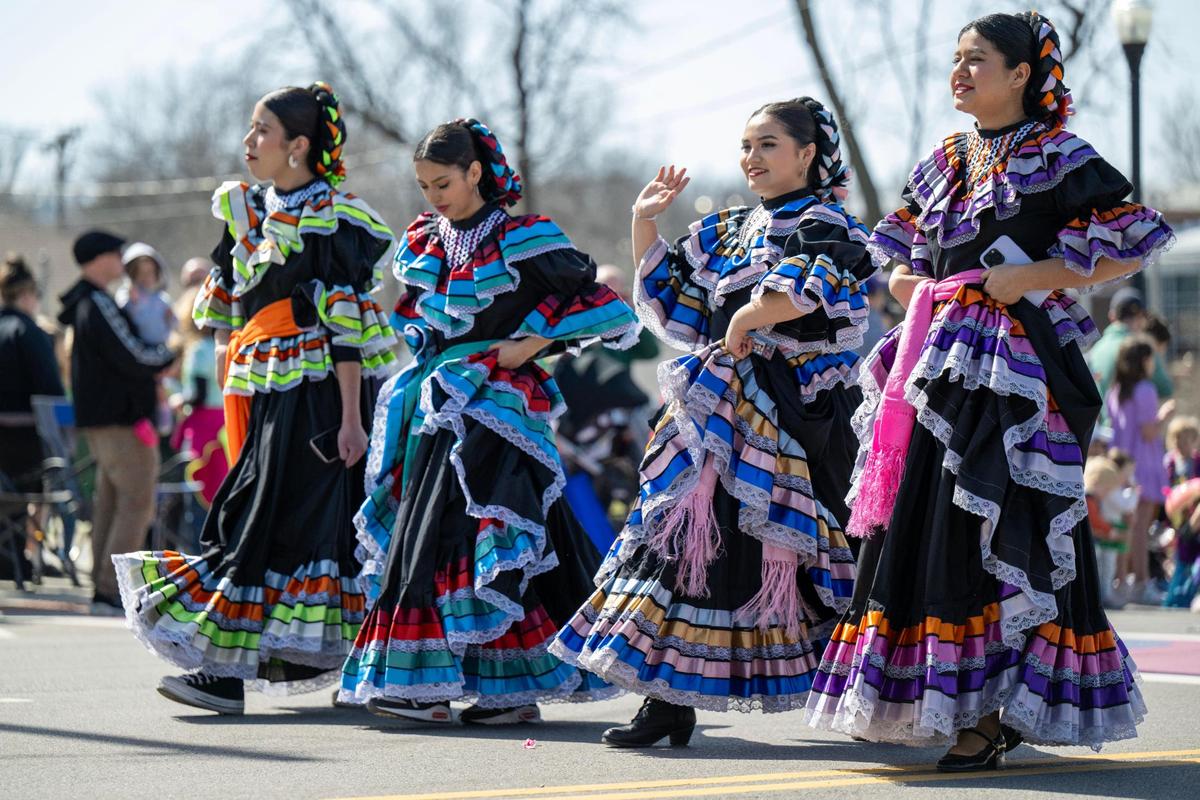Dancers from Grupo Folklorico Izcalli, a Hispanic dance troupe, strolled Johnson Drive as people gathered to watch the 38th annual Shawnee St. Patrick’s Day Parade in March 2024.