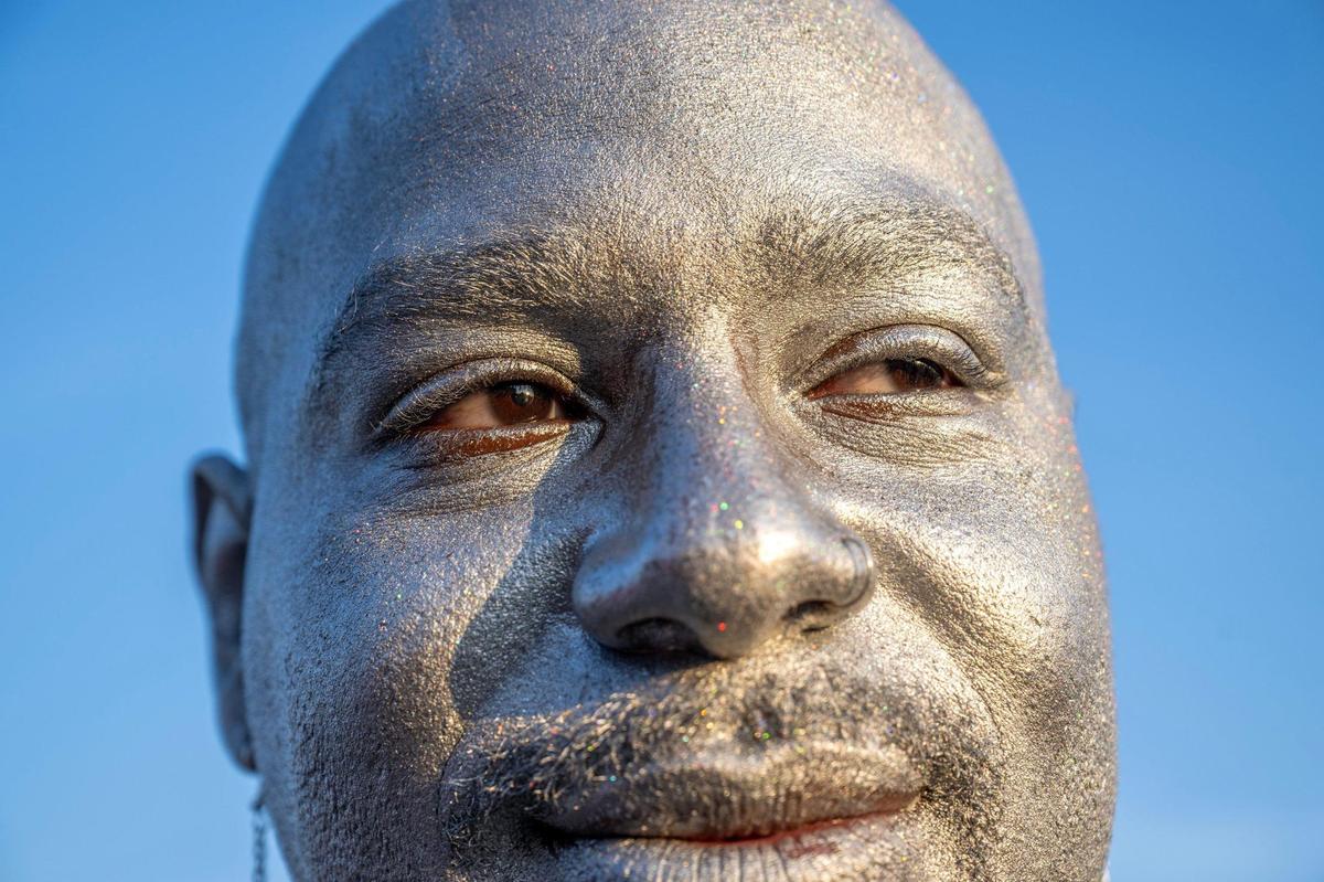 DeUndra Jones, from Memphis, Tennessee, sports silver glitter face paint before attending the last stop of Beyoncé’s Renaissance World Tour at GEHA Field at Arrowhead Stadium on Sunday, Oct. 1, 2023, in Kansas City.