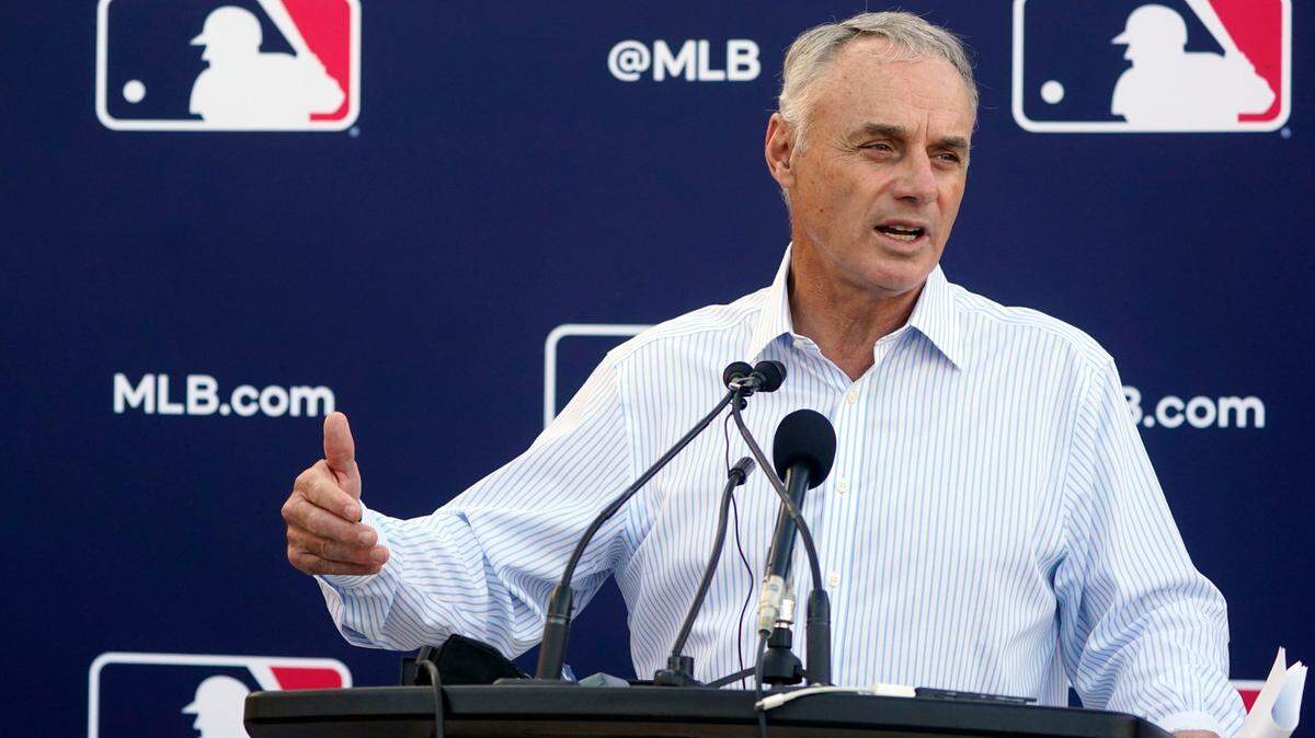 Major League Baseball Commissioner Rob Manfred speaks during a news conference after negotiations with the players’ association toward a labor deal, Tuesday, March 1, 2022, at Roger Dean Stadium in Jupiter, Fla. Manfred said he is canceling the first two series of the season that was set to begin March 31, dropping the schedule from 162 games to likely 156 games at most. Manfred said the league and union have not made plans for future negotiations. Players won’t be paid for missed games. (AP Photo/Wilfredo Lee)