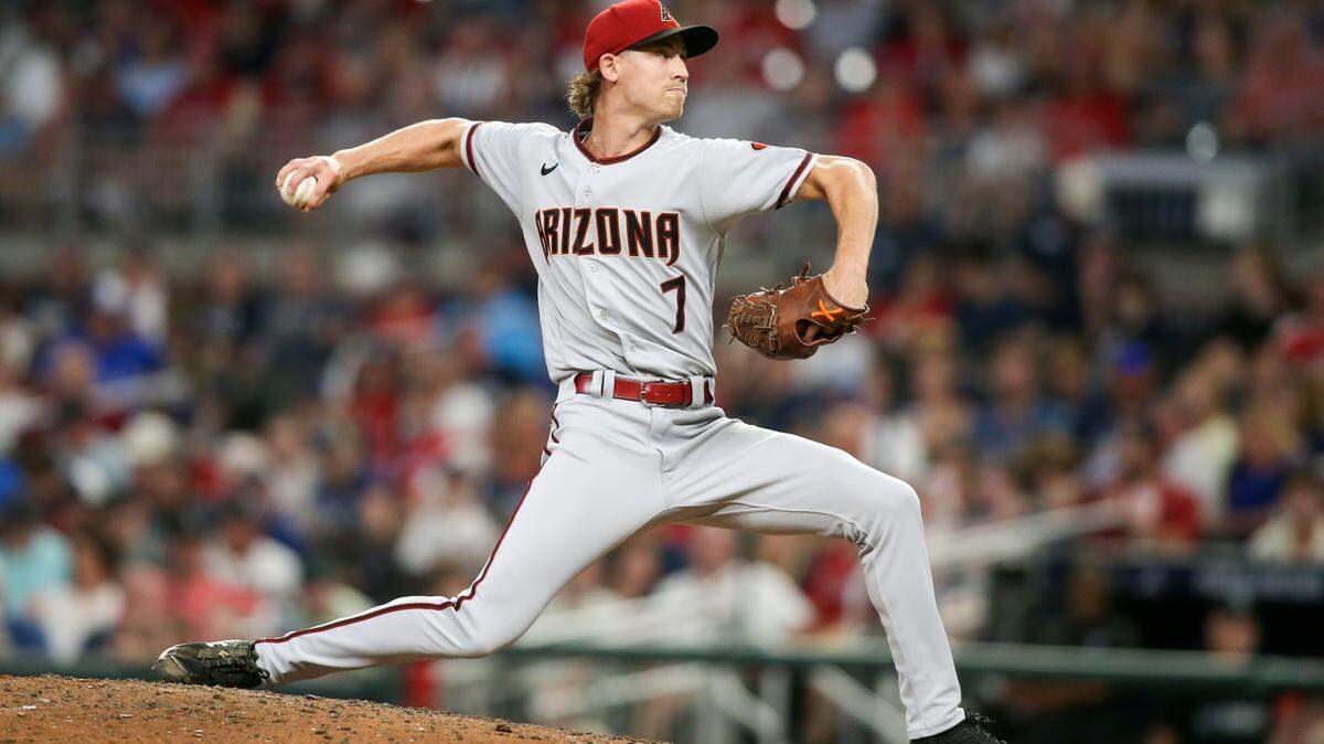 Arizona Diamondbacks relief pitcher Luke Weaver (7) throws in the eighth inning of a baseball game against the Atlanta Braves, Friday, July 29, 2022, in Atlanta. (AP Photo/Brett Davis)